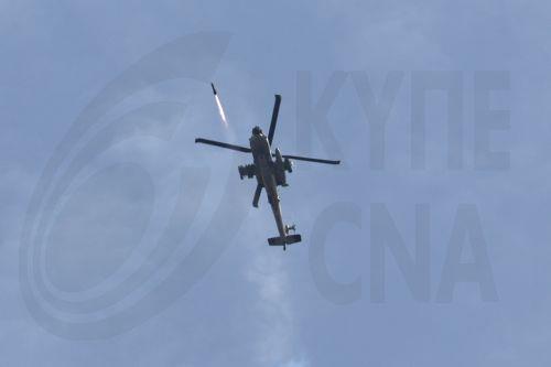 epa12829638 An Israeli military helicopter firing a missile toward targets in Lebanon, seen from the upper Galilee on the Israel-Lebanon border, 18 March 2026. The Israeli military stated it is conducting strikes across Lebanon targeting Hezbollah infrastructure and personnel.  EPA/ATEF SAFADI