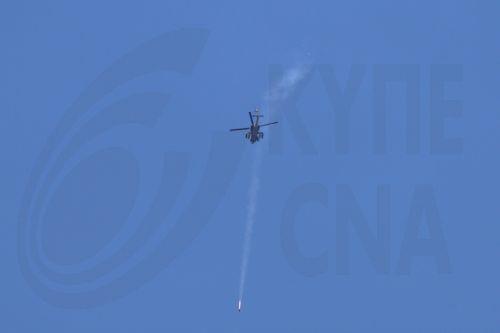 epa12829640 An Israeli military helicopter firing a missile toward targets in Lebanon, seen from the upper Galilee on the Israel-Lebanon border, 18 March 2026. The Israeli military stated it is conducting strikes across Lebanon targeting Hezbollah infrastructure and personnel.  EPA/ATEF SAFADI