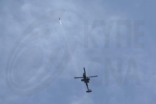 epa12829641 An Israeli military helicopter firing a missile toward targets in Lebanon, seen from the upper Galilee on the Israel-Lebanon border, 18 March 2026. The Israeli military stated it is conducting strikes across Lebanon targeting Hezbollah infrastructure and personnel.  EPA/ATEF SAFADI