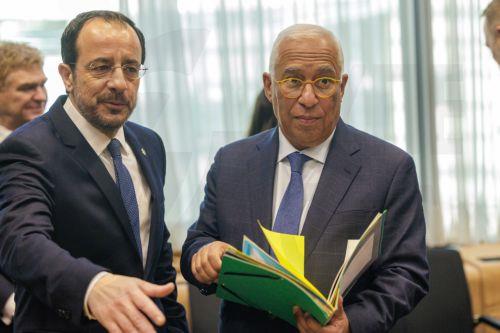 epa12829695 President of Cyprus Nikos Christodoulides (L) and EU Council President Antonio Costa attend the EU Tripartite Social Summit in the EU Council in Brussels, Belgium, 18 March 2026.  EPA/OLIVIER MATTHYS