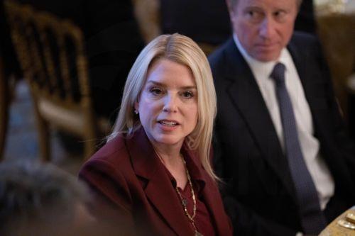 epa12834968 United States Attorney General Pam Bondi during a dinner hosted by US President Donald Trump with Prime Minster Takeuchi Sanae of Japan in the State Dining Room of the White House in Washington DC, USA, 19 March 2026.  EPA/AARON SCHWARTZ / POOL