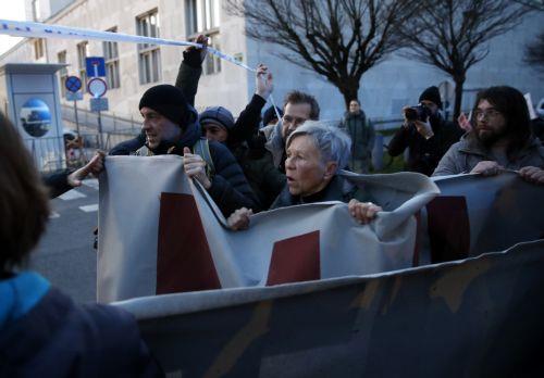 epa12837170 Slovenians protest outside the American Embassy against Janez Jansa and his Slovenian Democratic Party party (SDS) in downtown Ljubljana, Slovenia, 20 March 2026. The 22 March 2026 parliamentary election will take place as reports of an alleged covert operation by a private intelligence company to influence the vote have been made.  EPA/ANTONIO...