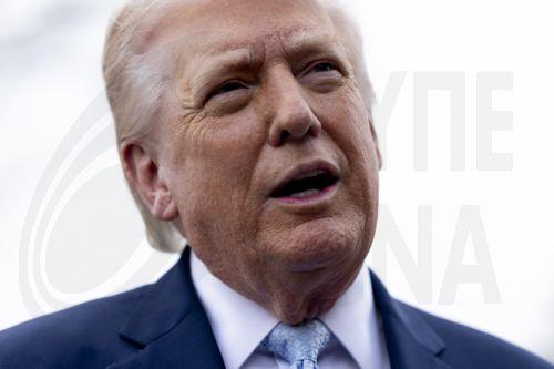 epa12837369 US President Donald J. Trump responds to a question from the news media as he walks to board Marine One on the South Lawn of the White House in Washington, DC, USA, 20 March 2026.  EPA/SHAWN THEW / POOL