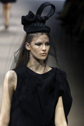 epa12838245 A model takes to the catwalk with designs of Angel Schlesser during the Mercedes-Benz Fashion Week Madrid (MBFWMadrid), in Madrid, Spain, 21 March 2026.  EPA/J.J.Guillen