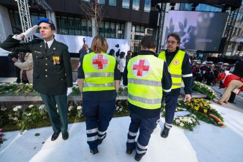 epa12841111 Members of the Red Cross attend a memorial ceremony on the 10th anniversary of the Brussels attacks in Brussels, Belgium, 22 March 2026. Brussels was struck by coordinated suicide bombings on 22 March 2016, claimed by the so-called Islamic State. Two blasts detonated in the departure hall of Zaventem Airport and a third at Maelbeek metro station...