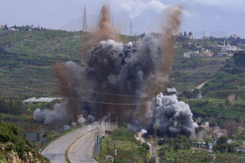 epa12841451 Smoke and flames rise after an Israeli strike targeting the Qasmiya Bridge near Tyre, in southern Lebanon, 22 March 2026. According to the Lebanese National News Agency (NNA), the Israeli military carried out an airstrike on the Qasmiya Bridge, a key crossing point over the Litani River connecting southern Lebanon to the north.  EPA/STRINGER