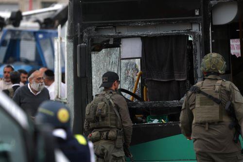 epa12843883 Israeli security, rescue, and paramedics at the scene of a direct hit by a missile fired by Hezbollah in the northern  Israeli city of Kiryat Shmona, 23 March 2026. The Israeli military stated it is conducting strikes across Lebanon targeting Hezbollah infrastructure and personnel.  EPA/ATEF SAFADI