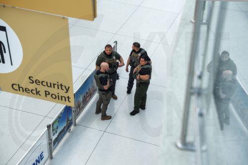 epa12844113 US Enforcement and Removal Operations (ERO) and Immigration and Customs Enforcement (ICE) agents patrol Terminal 1 of the John F. Kennedy International Airport, amid congestion caused by the Department of Homeland Security (DHS) shutdown, in the Queens of borough of New York, New York, USA, 23 March 2026. ICE agents have begun deploying to major...