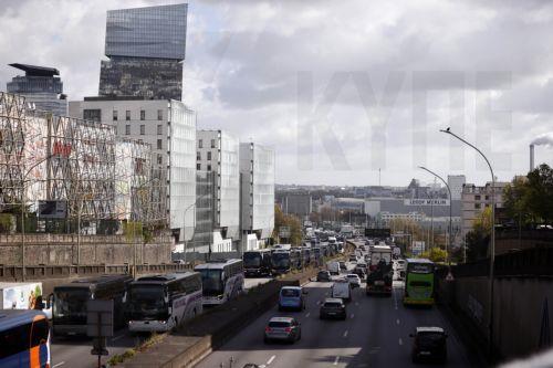 epa12859834 Truck and bus drivers stage a slowdown on the city’s ring road to protest against the rising fuel prices in Paris, France, 30 March 2026.  EPA/YOAN VALAT