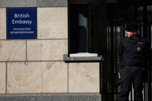 epa12860127 A police officer guards the entrance to the British Embassy in Moscow, Russia, 30 March 2026. The Second Secretary of the British Embassy in Moscow, Jance Gerardus, has been ordered to leave Russia within two weeks following the revocation of his accreditation by the Russian Federal Security Service (FSB) over espionage allegations.  EPA/MAXIM...