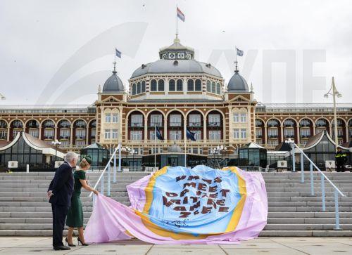 epa12866050 Dutch Queen Maxima (2-L) unveils a new staircase in front of the Grand Hotel Kurhaus during the official reopening of the renovated Scheveningen boulevard, in The Hague, The Netherlands, 02 April 2026. The renovated boulevard is wider and greener, designed for better climate resilience and event space.  EPA/REMKO DE WAAL