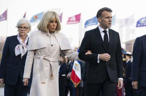 epaselect epa12865943 French President Emmanuel Macron (R) and his wife Brigitte Macron (2-L) arrive to pay tribute to the victims of the Korean War during his visit to the war memorial in Seoul, South Korea, 02 April 2026. French President Emmanuel Macron is on a state visit to South Korea.  EPA/JEON HEON-KYUN