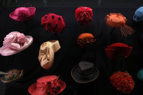 epa12877221 A selection of hats are displayed at the exhibition 'Queen Elizabeth II: Her Life in Style' at The King’s Gallery, Buckingham Palace in London, Britain, 09 April 2026. The exhibition features 300 pieces of clothing and accessories worn by late Britain’s Queen Elizabeth and runs from 10 April to 18 October 2026.  EPA/NEIL HALL