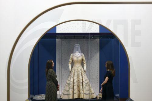 epa12877229 The wedding dress of Britain’s Queen Elizabeth II worn in 1947 is displayed at the exhibition 'Queen Elizabeth II: Her Life in Style' at The King’s Gallery, Buckingham Palace in London, Britain, 09 April 2026. The exhibition features 300 pieces of clothing and accessories worn by late Britain’s Queen Elizabeth and runs from 10 April to 18...