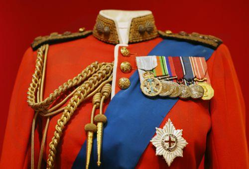 epa12877253 A ceremonial tunic of Britain’s Queen Elizabeth II is displayed at the exhibition 'Queen Elizabeth II: Her Life in Style' at The King’s Gallery, Buckingham Palace in London, Britain, 09 April 2026. The exhibition features 300 pieces of clothing and accessories worn by late Britain’s Queen Elizabeth and runs from 10 April to 18 October 2026. ...
