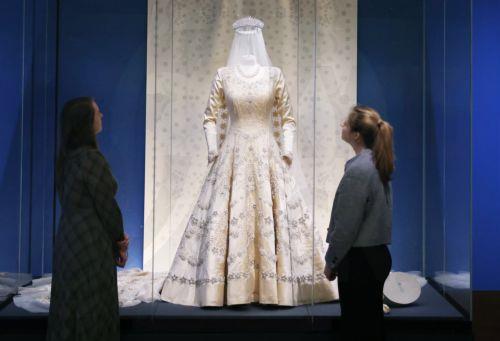epa12877282 The wedding dress of Britain’s Queen Elizabeth II worn in 1947 is displayed at the exhibition 'Queen Elizabeth II: Her Life in Style' at The King’s Gallery, Buckingham Palace in London, Britain, 09 April 2026. The exhibition features 300 pieces of clothing and accessories worn by late Britain’s Queen Elizabeth and runs from 10 April to 18...