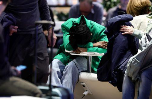 epa12879839 Passengers wait in Terminal 1 during a strike at the international airport at Frankfurt Airport, in Frankfurt am Main, Germany, 10 April 2026. The UFO cabin crew union has called on its members to strike, to press their demands for better wages.  EPA/RONALD WITTEK