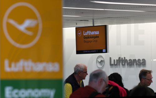 epa12879840 Passengers at a Lufthansa baggage drop area in Terminal 1 during a strike at the international airport at Frankfurt Airport, in Frankfurt am Main, Germany, 10 April 2026. The UFO cabin crew union has called on its members to strike, to press their demands for better wages.  EPA/RONALD WITTEK