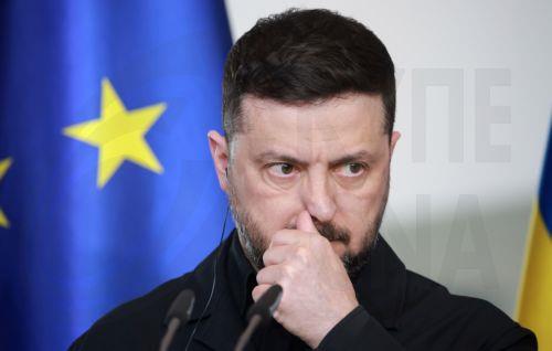 epa12888789 Ukrainian President Volodymyr Zelensky attends a press conference at the Chancellery in Berlin, Germany, 14 April 2026. Following the Hungarian elections on 12 April, the German government expects that the EU’s 90 billion euro loan package for Ukraine will be unblocked swiftly.  EPA/CLEMENS BILAN