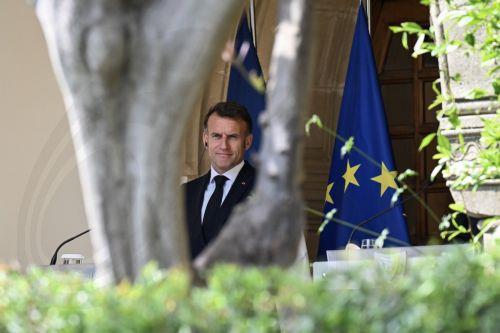 epa12909324 France's President Emmanuel Macron listens as his Cypriot counterpart delivers statements after a meeting at the Presidential Palace in Nicosia, Cyprus, 23 April 2026, on the sidelines of a European summit. EU leaders hold an informal meeting to address current geopolitical developments and Europe's response to them.  EPA/JEWEL SAMAD / POOL