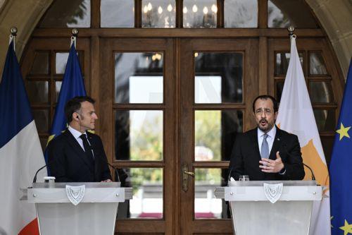 epa12909326 Cyprus’ President Nikos Christodoulides (R) and French President Emmanuel Macron deliver statements after a meeting at the Presidential Palace in Nicosia, Cyprus, 23 April 2026, on the sidelines of a European summit. EU leaders hold an informal meeting to address current geopolitical developments and Europe's response to them.  EPA/JEWEL SAMAD /...
