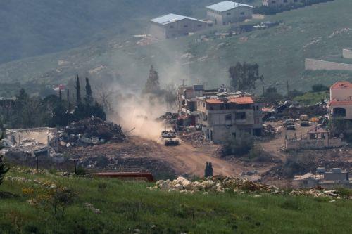 epa12915590 Israeli military vehicles maneuver on the Lebanese side of the border, as seen from the Upper Galilee in northern Israel, 26 April 2026, amid a ceasefire between Israel and Lebanon. On 26 April, Israeli Prime Minister Netanyahu has ordered the military to 'vigorously' target Hezbollah positions, accusing the group of ceasefire violations. ...