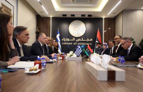 epa12917046 Libya's acting Foreign Minister Taher Al-Baour (R) meets with Greek Foreign Minister George Gerapetritis (3-L) in Tripoli, Libya, 27 April 2026.  EPA/STRINGER