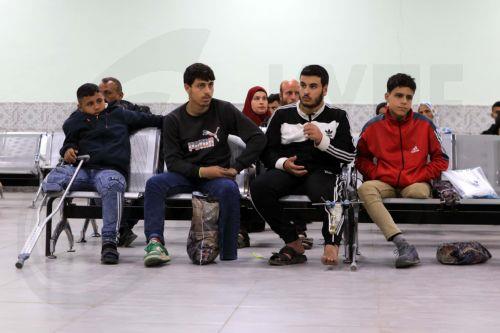 epa12918023 Wounded Palestinians are seen as evacuees from Gaza arrive for medical treatment at the King Hussein Bridge crossing in South Shuna, Jordan, 27 April 2026. A group of at least 81 injured people from the Gaza Strip arrived in Jordan for medical care, accompanied by 108 parents and family members. The evacuation is part of a humanitarian effort to...