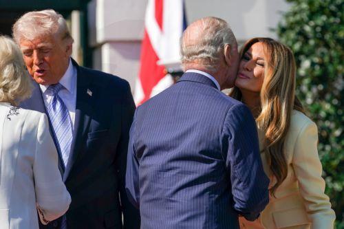 epaselect epa12918051 Britain's King Charles III (2-R) and Queen Camilla (L) are greeted by US President Donald Trump (2-L) and First Lady Melania Trump (R) at the White House in Washington, DC, USA, 27 April  2026. King Charles III and Queen Camilla are on a four-day state visit to the US that also includes engagements in New York and Virginia. ...