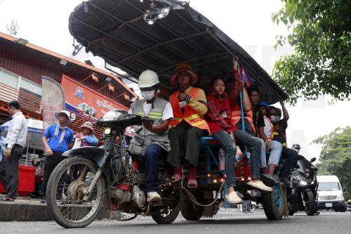 epaselect epa12925906 Cambodian workers travel to the US Embassy in Phnom Penh, Cambodia, 01 May 2026. Around 200 worker representatives, trade unions, and civil society organizations submit a joint petition to embassies and relevant government institutions on 01 May 2026 to mark the 140th anniversary of International Workers' Day. The initiative is held...