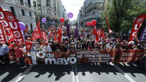 epa12926135 People take part in a rally to mark International Workers' Day in Madrid, Spain, 01 May 2026.  EPA/J.J.Guillen