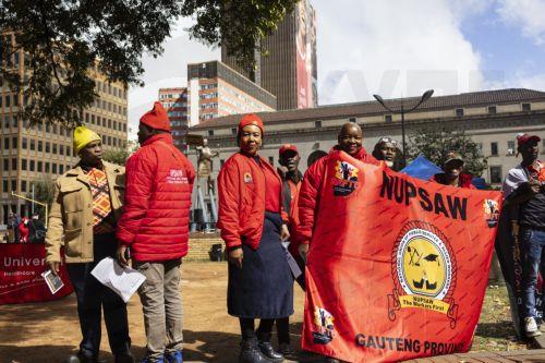 epa12926145 Members of the South African Federation of Trade Unions gather during a May Day event held in downtown Johannesburg, South Africa, 01 May 2026. Members of trade unions gathered to bring attention to job losses in South Africa due to economic conditions. Official unemployment figures are at 33 percent of the adult population, meaning 8 million...