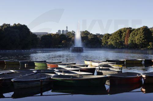 epa12929331 The autumn sun rises over rowing boats on Zoo Lake in Johannesburg, South Africa, 03 May 2026. The lake is a popular area for walkers, runners, and weekend picnics.  EPA/Kim Ludbrook