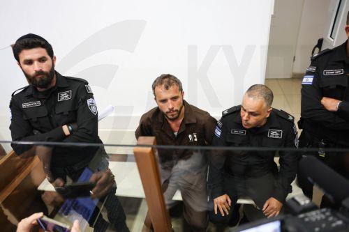 epa12929415 Thiago Avila (C), a member of the Global Sumud Flotilla, arrives to attend his trial for a remand extension at the Ashkelon Magistrate's Court in Ashkelon, Israel, 03 May 2026. Thiago Avila along with Abu Keshek were arrested on 02 May off the island of Crete, according to the organization. According to the Israeli Ministry of Foreign Affairs,...