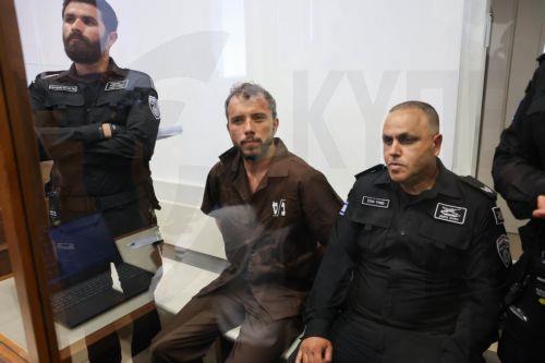 epa12929418 Thiago Avila (C), a member of the Global Sumud Flotilla, arrives to attend his trial for a remand extension at the Ashkelon Magistrate's Court in Ashkelon, Israel, 03 May 2026. Thiago Avila along with Abu Keshek were arrested on 02 May off the island of Crete, according to the organization. According to the Israeli Ministry of Foreign Affairs,...