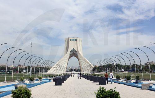 epa12938643 People walk around Azadi Tower in Tehran, Iran, 07 May 2026. US President Donald Trump announced a pause in the operation of escorting ships through the Strait of Hormuz, signaling progress in peace talks with Tehran.  EPA/ABEDIN TAHERKENAREH
