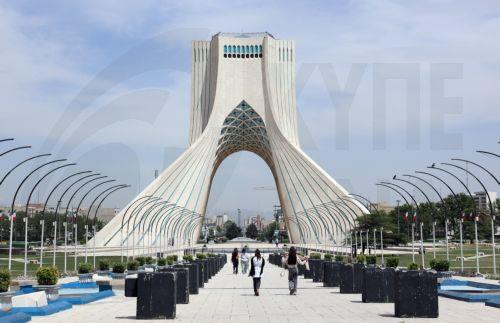 epa12938647 People walk around Azadi Tower in Tehran, Iran, 07 May 2026. US President Donald Trump announced a pause in the operation of escorting ships through the Strait of Hormuz, signaling progress in peace talks with Tehran.  EPA/ABEDIN TAHERKENAREH