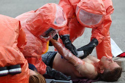 epa12947948 Members of the Bavarian Red Cross and a role player participate in an exercise demonstrating the organization’s complex emergency response system in Munich, Germany, 11 May 2026. The drill involved more than 75 emergency responders and role players and simulated a mass casualty incident caused by a crowd accident and the leak of an initially...