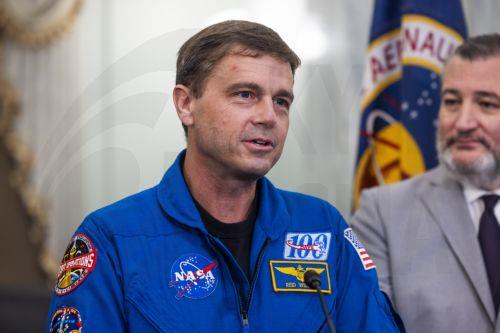 epa12950463 Artemis II Commander Reid Wiseman speaks while meeting with US Senators in the Russell Senate Office Building in Washington, DC, USA, 12 May 2026. The four Artemis astronauts led NASA's first crewed space mission to orbit the moon in more than 50 years.  EPA/JIM LO SCALZO