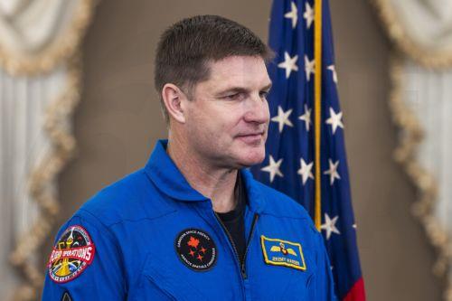 epa12950468 Artemis II Mission Specialist Jeremy Hansen prepares to meet with US Senators in the Russell Senate Office Building in Washington, DC, USA, 12 May 2026. The four Artemis astronauts led NASA's first crewed space mission to orbit the moon in more than 50 years.  EPA/JIM LO SCALZO