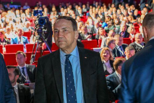 epa12952948 Polish Deputy Prime Minister, Minister of Foreign Affairs Radoslaw Sikorski attends the inaugural conversation 'Europe on a strategic course - security, sovereignty and the future of economic cooperation' during the opening of the 12th International Maritime Congress at the Polish Theatre in Szczecin, north-western Poland, 13 May 2026. For two...