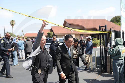 epa12972642 San Diego Mayor Todd Gloria (C-R) emerges after meeting with members of the Islamic Center of San Diego, gathered a block away from where a gunman opened fire in San Diego, California, USA, 18 May 2026. Police agencies from across San Diego County responded to an active shooter incident at the Islamic Center of San Diego in the Clairemont...