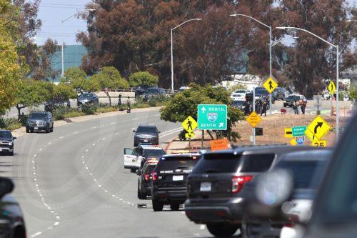 epa12972656 Law enforcement personnel gather on the scene to respond to an active shooting incident at the Islamic Center of San Diego, located in the Clairemont neighborhood in San Diego, California, USA, 18 May 2026.  Police agencies from across San Diego County responded to an active shooter incident at the Islamic Center of San Diego in the Clairemont...