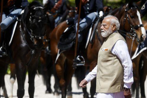 epa12977238 Indian Prime Minister Narendra Modi is welcomed by Italian Prime Minister Giorgia Meloni (not pictured) prior to a meeting at Villa Pamphili in Rome, Italy, 20 May 2026.  EPA/ANGELO CARCONI