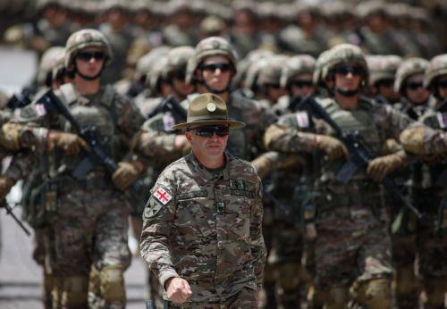 epa12994479 Georgian servicemen take part in a military parade marking the country's 108th Independence Day in Tbilisi, Georgia, 26 May 2026. Georgia declared its independence from Russia on 26 May 1918.  EPA/DAVID MDZINARISHVILI