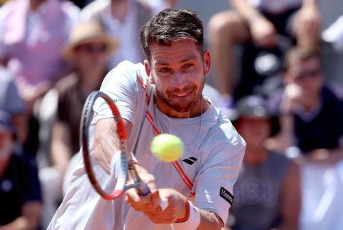 epa12994978 Cameron Norrie of Great Britain hits a backhand during his Men's 1st round match against Adolfo Daniel Vallejo of Paraguay at the French Open Grand Slam tennis tournament at Roland Garros in Paris, France, 26 May 2026.  EPA/CHRISTOPHE PETIT TESSON
