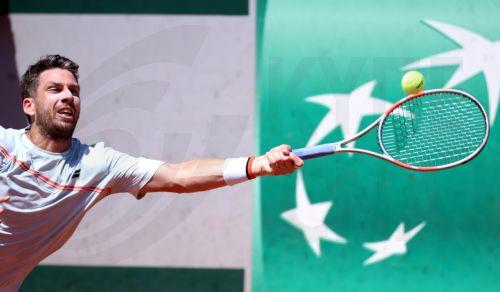 epa12994979 Cameron Norrie of Great Britain hits a forehand during his Men's 1st round match against Adolfo Daniel Vallejo of Paraguay at the French Open Grand Slam tennis tournament at Roland Garros in Paris, France, 26 May 2026.  EPA/CHRISTOPHE PETIT TESSON