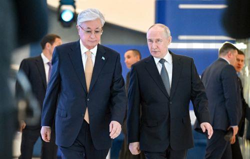 epa13000901 Kazakh President Kassym-Jomart Tokayev (L) and Russian President Vladimir Putin arrive to attend a plenary session of the 5th Eurasian Economic Forum (EEF) at the Eurasian Economic Union (EAEU) summit in Astana, Kazakhstan, 28 May 2026. The Eurasian Economic Union (EAEU) involves five core member states that make up the union - Armenia, Belarus,...