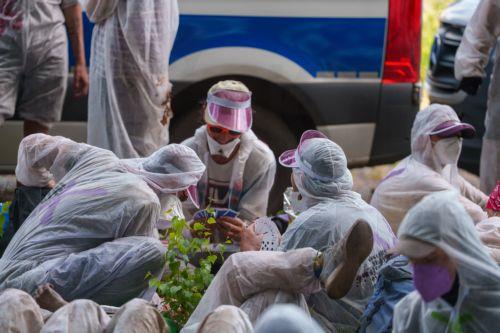 epa13003745 Protesters play cards at a Uniper power plant in Gelsenkirchen, Germany, 29 May 2026. Members of the organization 'Ende Gelaende' entered the plant's grounds during a protest action, leading to a blockade of the facility.  EPA/CHRISTOPH RUTENKOLK