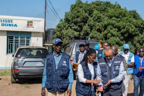 epa13006206 World Health Organization (WHO) Director-General Tedros Adhanom Ghebreyesus (R) gets a hand sanitiser during a visit at a renovated building designed for the treatment of Ebola virus patients in Bunia, Ituri, Democratic Republic of Congo, 31 May 2026. According to WHO, the Bundibugyo virus disease (BVD) outbreak in the Democratic Republic of the...